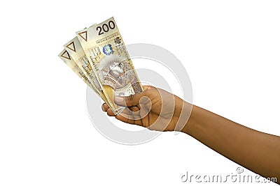 Fair hand holding polish zÅ‚oty notes isolated on white background Stock Photo