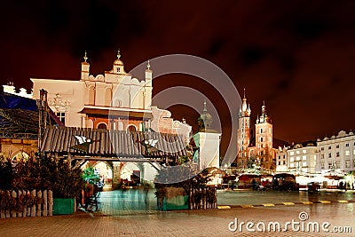Fair in KRAKOW. Main Market Square and St. Mary`s Basilica Editorial Stock Photo