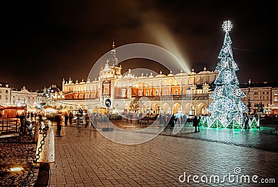 Fair in KRAKOW. Main Market Square and Sukiennice in the evening Editorial Stock Photo