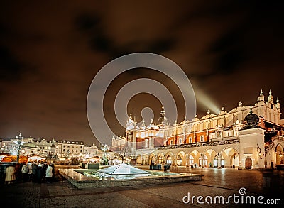 Fair in KRAKOW. Main Market Square and Sukiennice in the evening. Editorial Stock Photo