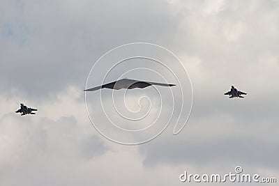 A B2 stealth bomber fly over the Fairford Air Base after a global power mission over the baltic sea Editorial Stock Photo