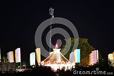 Fairground Carousel and Flags Stock Photo