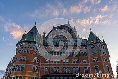 Fairmont Le Chateau Frontenac sunset time view. Quebec City Old Town in autumn dusk. Editorial Stock Photo