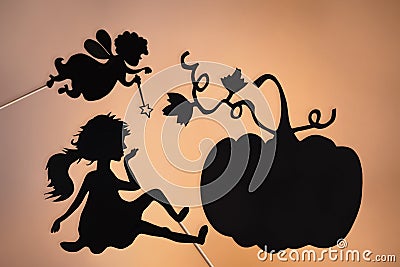 Fairy Godmother, Cinderella and Pumpkin shadow puppets Stock Photo