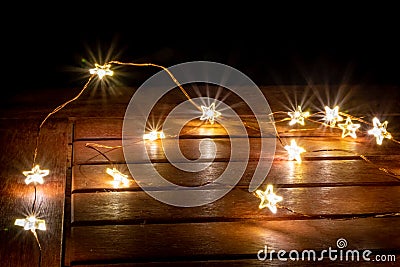 Fairy lights for christimas as illuminated decoration for christmas tree or as festive lights on the table create a romantic mood Stock Photo