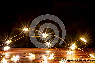 Fairy lights for christimas as illuminated decoration for christmas tree or as festive lights on the table create a romantic mood Stock Photo