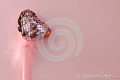 Fairy magic wand on a pink pastel background Stock Photo
