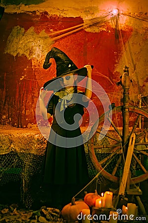 fairy tale portrait of a little girl in a hat. concept fairy halloween wizard. Stock Photo