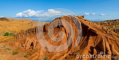 Fairy Tale rainbow canyon panorama `Skazka` in Kyrgyzstan Stock Photo