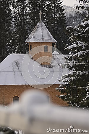 Fairytale winter scenery with snow covered pine trees and forest on the picturesque hills. Bucegi mountains Stock Photo