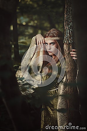 Fairytale woman with green dress Stock Photo