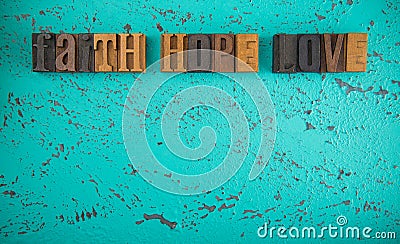 Faith Hope and Love Spelled in Wooden Type Set Block Letters Stock Photo