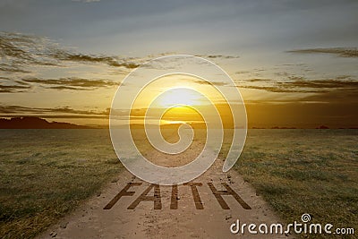 Faith text on the dirty road Stock Photo