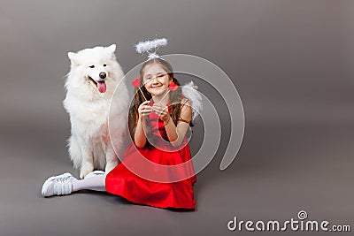 Faithful friends, a girl and a dog. Friendship symbol Stock Photo