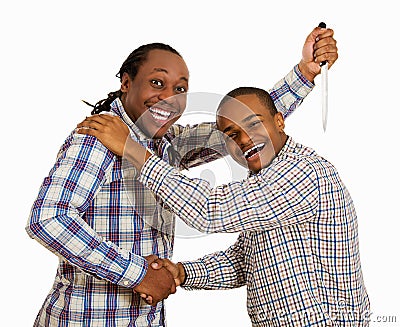 Fake friends, backstabbing concept Stock Photo