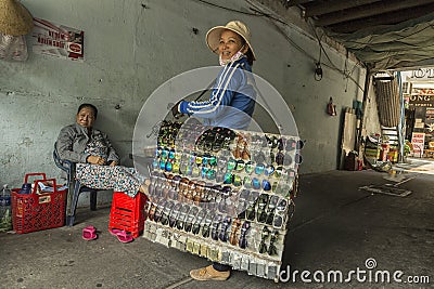 Fake glases street seller in Ho Chi Minh, Vietnam Editorial Stock Photo