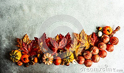 Fake maple leaves on the concrete background Stock Photo