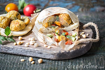 Falafel vegetarian fried balls of chickpea with pita bread and jomosom Stock Photo