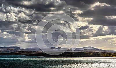 Falkland Islands,Malvinas sun shining through dramatic clouds Stock Photo