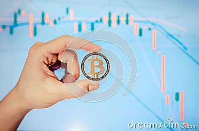 The fall of the Bitcoin course. Bitcoin price reduction. Cryptocurrency decline Stock Photo