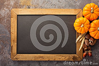 Fall chalkboard copy space with pumpkins Stock Photo