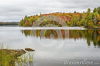 Fall Color on a Lake in Algonquin Provincial Park, Ontario, Canada Stock Photo