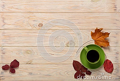 Fall concept. Cups of coffee and autumn leaves on a light wooden Stock Photo