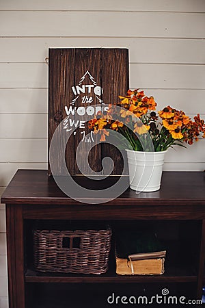 Fall at country house. Seasonal rustic decorations with cozy blankets and flowers Stock Photo