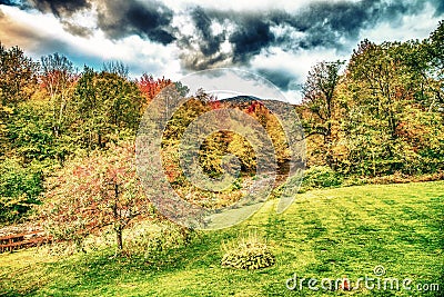 Fall Foliage across the rolling hills of Vermont. Peak fall color on a beautiful sunny day in New England Stock Photo