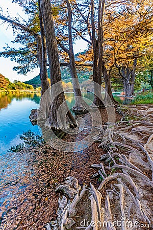 Fall foliage on the crystal clear Frio River in Texas. Stock Photo