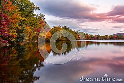 Fall foliage reflects in Hessian Lake Stock Photo