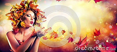 Fall Incoming - Model Woman Blowing Red Magic Leaves Stock Photo