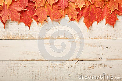 Fall leaves frame on whooden background Stock Photo