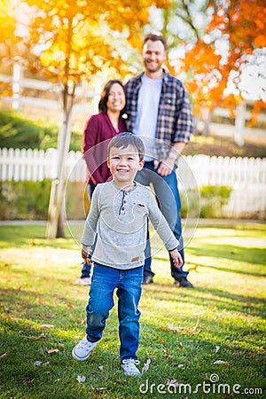 Fall Portrait of Happy Mixed Race Chinese and Caucasian Family Stock Photo