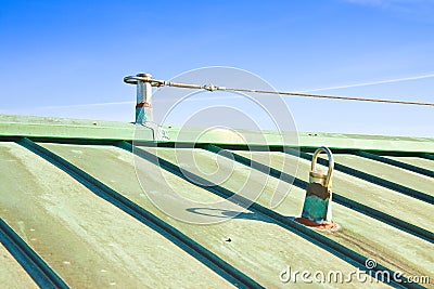 Fall protection steel cable on copper roof - Italy where they ar Stock Photo