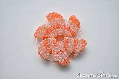 Fall season sugar coated orange slice candy pinwheel shape Stock Photo