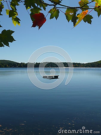 Fall: serene lake with diving platform Stock Photo