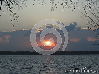 After the fall storm sunset over Grosse Isle Michigan Stock Photo