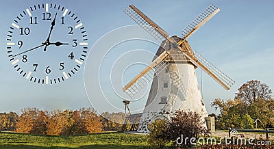 Fallback time. Abstract photo with windmill and Autumn landscape. Time change concept Stock Photo