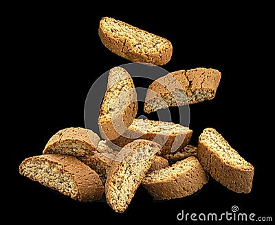 Cantuccini biscuits, Italian almond cookies on black background Stock Photo