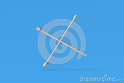 Falling cross wheel wrench on blue background Stock Photo