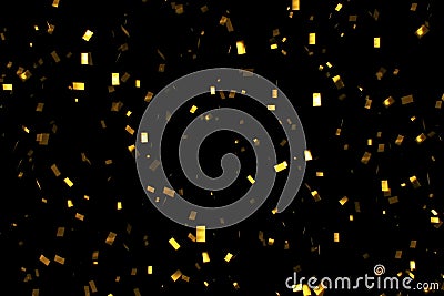 Falling gold glitter foil confetti, on black background, holiday and festive fun Stock Photo