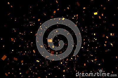 Falling gold sparkle glitter foil confetti, on black background, happy new year holiday and festive fun Stock Photo