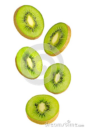 Falling green kiwi isolated on white background. Stock Photo