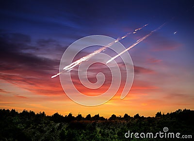 Falling meteorite, asteroid, comet on Earth. Elements of this image furnished by NASA. Stock Photo