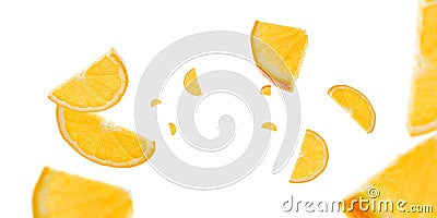 Falling sliced Orange fruit background. Citrus tangerine flight in air. Fresh food concept. Stock Photo