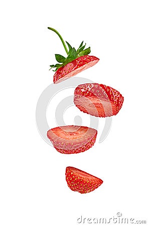 Falling sliced strawberry isolated on white background. Summer harvest. Close up, copy space, side view Stock Photo