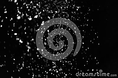Falling snow on a black background. Snowfall weather. Texture for overlay Stock Photo