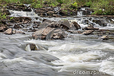 Falls of Dochart near Killin in Scottish Highlands, long exposure Stock Photo