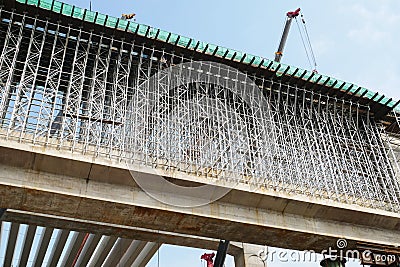 Falsework work at the construction site. It consists of temporary structures used in construction to support a permanent structure Stock Photo